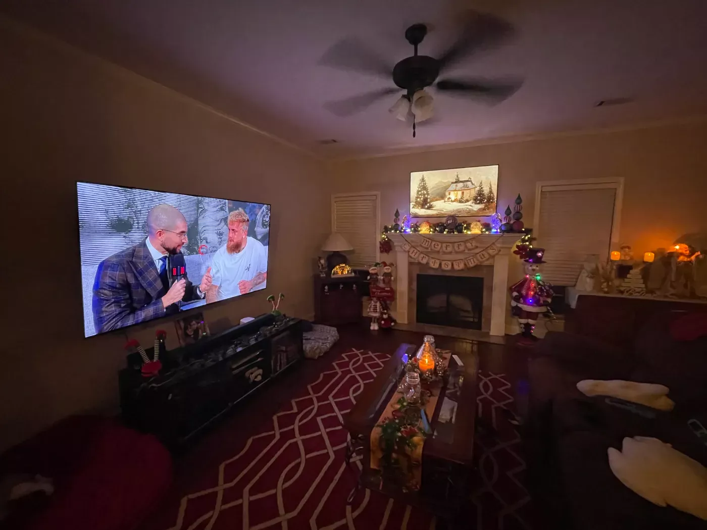 Home theater with a big screen and room-filling sound by Home Tech Solutions